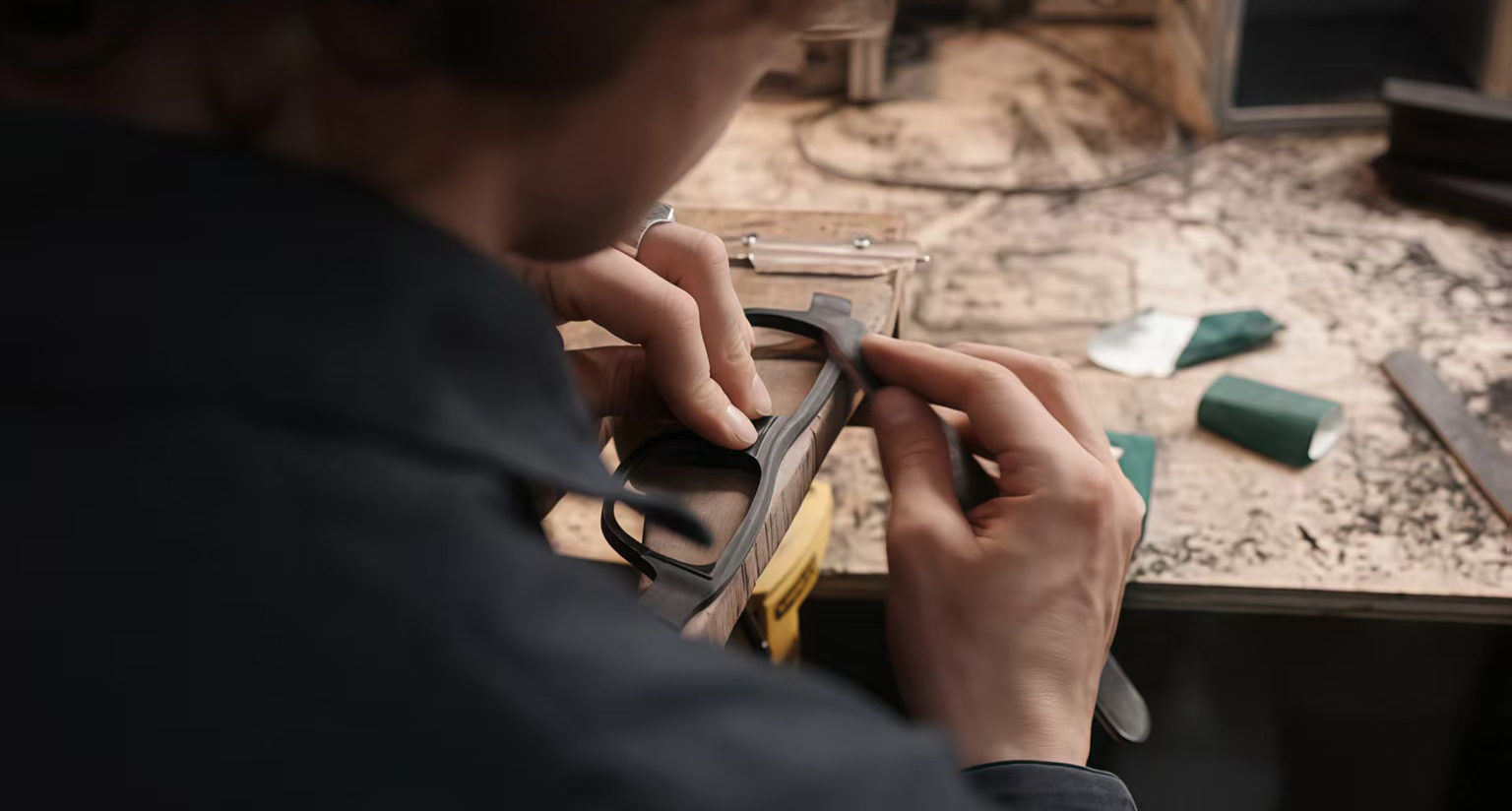 Hand polishing sunglasses for tactile finish